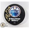 Image 1 : JUSTIN SCHULTZ AUTOGRAPHED EDMONTON OILERS PUCK