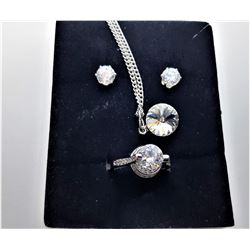 13)  SET OF CLEAR CRYSTAL STUD EARRINGS