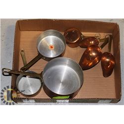 4 COPPER SAUCE PANS AND MEASURING CUPS