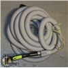 Image 1 : POWERED BUILT-IN VACUUM HOSE