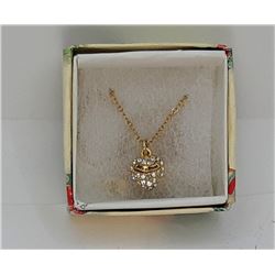 12)  GOLD TONE AND CLEAR CZ HEART