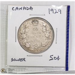 1929 SILVER 50 CENT COIN.
