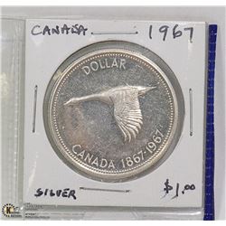 1967  CENTENNIAL GOOSE SILVER DOLLAR.