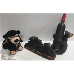 BOX WITH A BEAR HOLDING BOTTLE WHICH