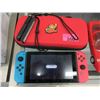 Image 1 : Nintendo Switch with Case