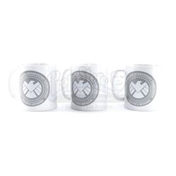 Lot #244 - Marvel's Agents of S.H.I.E.L.D. - Set of Three Silver and White S.H.I.E.L.D. Mugs