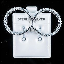 925 Sterling Silver Hoop Earrings with 30 Natural Blue Topaz = 4.00ct Appraised: $1065.00