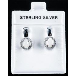 925 Sterling Silver Earrings .88cts Fiery Opals and 40 White Topaz. Appraised: $985.00