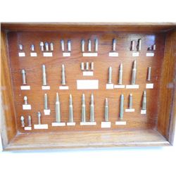 ASSORTED COLLECTABLE AMMO IN DISPLAY CASE WITH GLASS FRONT, NO GUARANTEE ON GLASS SHIPPING