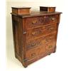 Image 1 : A CARVED OAK CHEST OF DRAWERS