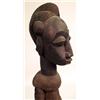 Image 2 : A CARVED WOODEN SCULPTURE OF A MAN