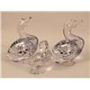 Image 1 : A GROUP OF THREE COLORLESS GLASS DUCKS
