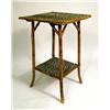 Image 1 : A BAMBOO AND FAUX LEOPARD SKIN COVERED 