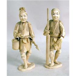 TWO CARVED IVORY FIGURES OF MEN