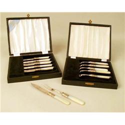 A SET OF SIX MOTHER-OF-PEARL HANDLED WI