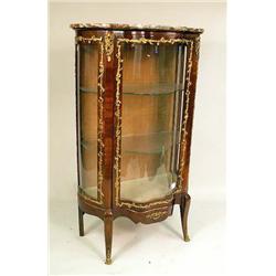 A LOUIS XV STYLE GILT METAL MOUNTED KIN