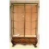Image 1 : A LOUIS XV STYLE CARVED WALNUT AND BRAS
