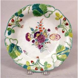A CHELSEA POLYCHROME DECORATED RIM SOUP