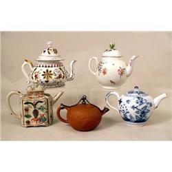 A GROUP OF FINE TEAPOTS
