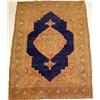 Image 1 : A TRIBAL RUG