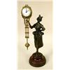 Image 1 : A BRONZED FIGURAL SWINGER CLOCK