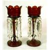 Image 1 : A PAIR OF RUBY HURRICANE LAMPS