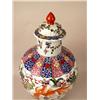 Image 2 : A POLYCHROME FLORAL AND FISH DECORATED 