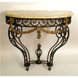 A LOUIS XVI STYLE PARCEL GILT WROUGHT I