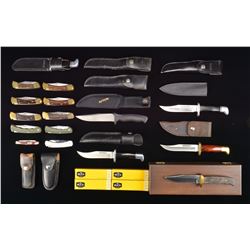 28 BUCK FIXED & FOLDING BLADE KNIVES.