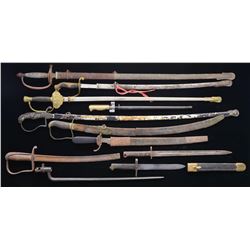 GROUP OF 11 EDGED WEAPONS.