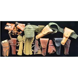 LOT OF MILITARY & COMMERCIAL HOLSTERS.