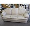 Image 1 : BEIGE LEATHER LOVESEAT (SOME PEN MARKS ON IT)