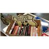 Image 2 : LOT OF VINTAGE WAR BOOKS AND 3 TIN SIGNS