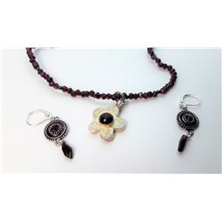 19)  NATURAL RED GARNET AND STERLING