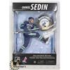 Image 1 : DANIEL SEDIN ACTION FIGURE WITH PUCK MCFARLANE