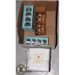 BOX OF ASSORTED CANDLES AND STAND