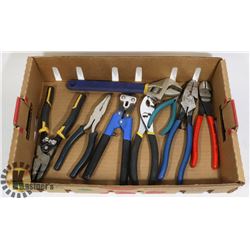 FLAT OF ASSORTED PLYERS AND A CRESCENT WRENCH