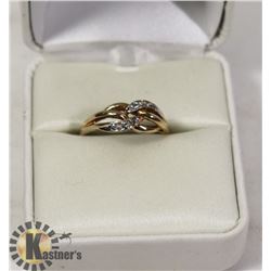 10 KT GOLD RING WITH 6 SMALL DIAMONDS -