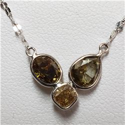 87) 18KT WHITE GOLD FANCY CUT & COLORED BROWN