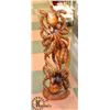 Image 1 : WOOD SCULPTURE OF 2 OCTAPUS FIGHTING OVER FISH