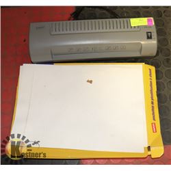 STAPLES LAMINATOR WITH PLASTICS AND POUCHES