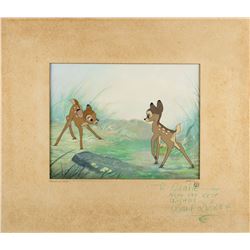 Walt Disney signed production cel and production background of Bambi and Faline from Bambi