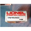 Image 9 : Lionel O gauge: 3 cabooses, tank car and box car, all NIB, and assorted used O gauge track