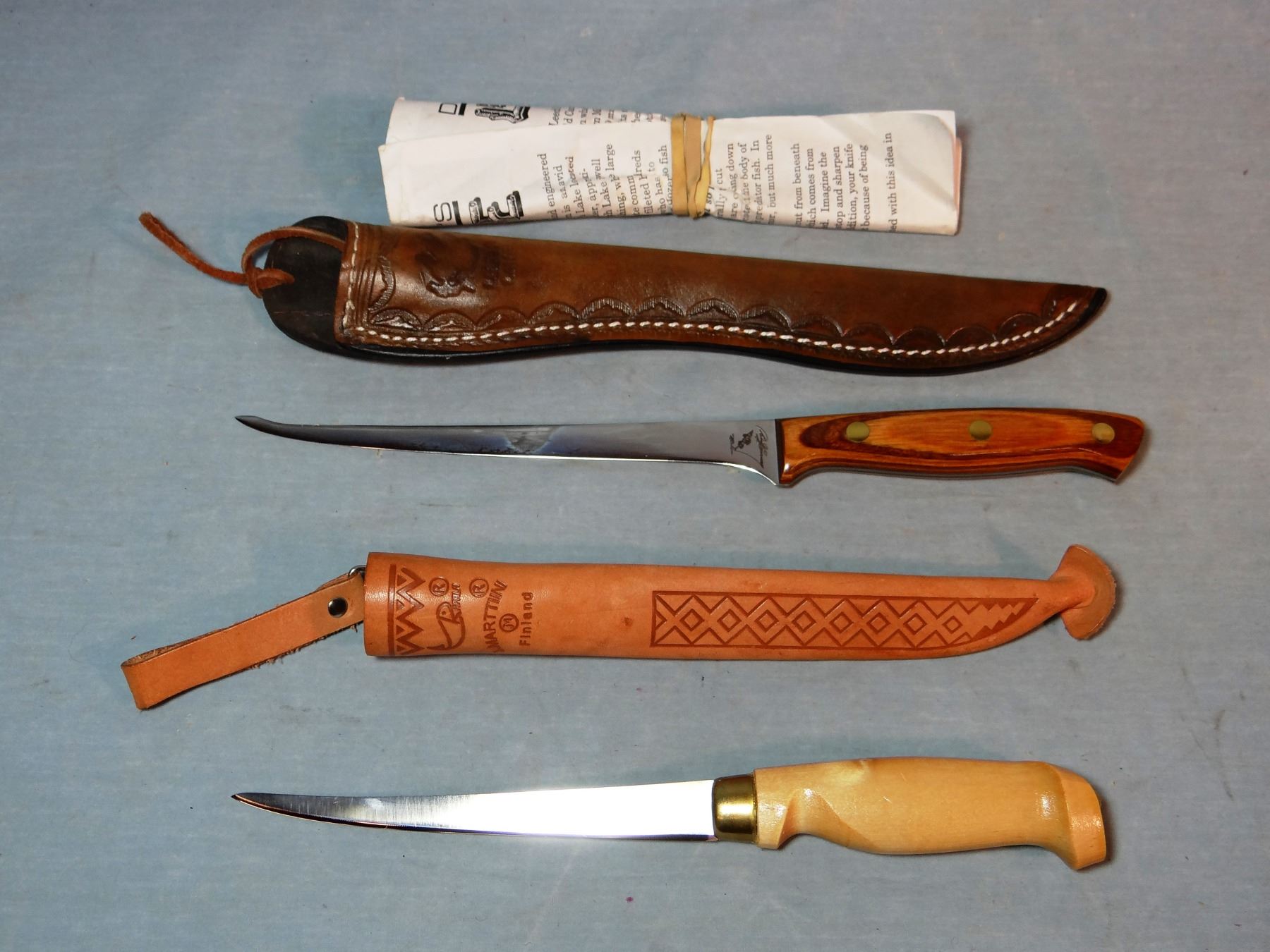 2 fish filet knives, Leech Lake Knife Co, Iowa and Finland made, both