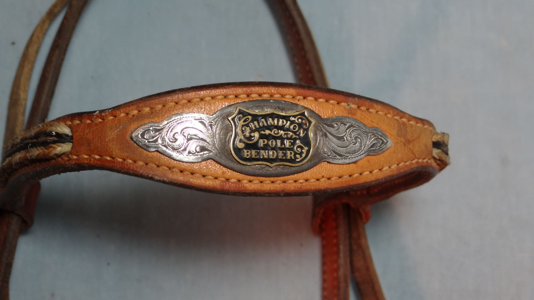 Trophy headstall, Champion Pole Bender, sterling silver on braided