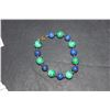 Image 1 : A 14Kt Gold Lapis and Malachite Bracelet