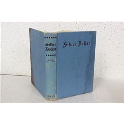 A Hardcover Book - Silver Dollar