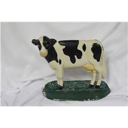 A Vintage Cast Iron Cow Door Stopper