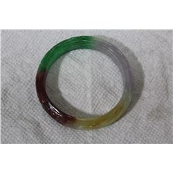 A Multicolor Carved Jade Bangle Bracelet