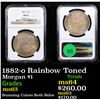 Image 1 : NGC 1882-o Rainbow Toned Morgan Dollar $1 Graded ms63 By NGC